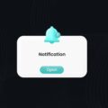 Ein weißes Benachrichtigungs-Popup mit einer türkisfarbenen Glocke und der Zahl '1' zeigt den Text 'Notification' sowie einen türkisfarbenen Button mit der Aufschrift 'Open' auf dunklem Hintergrund.